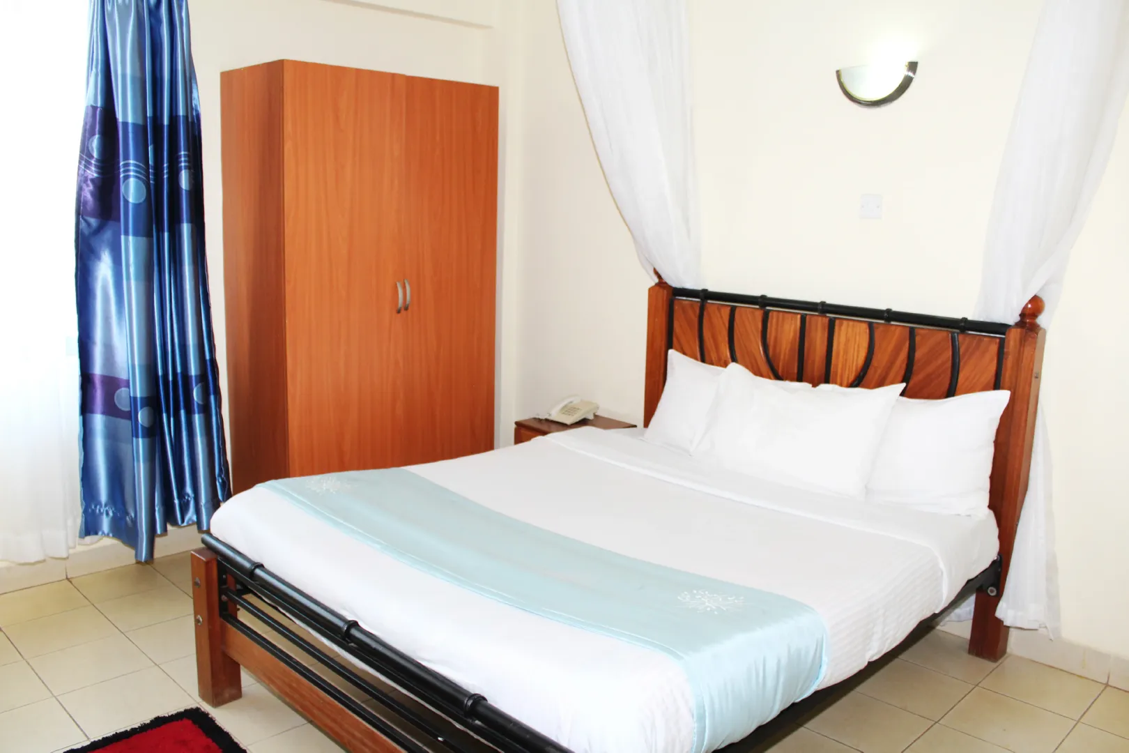 Meru Paramount Hotel  Standard Rooms offer a cozy and restful retreat, perfect for solo travelers seeking comfort and value.